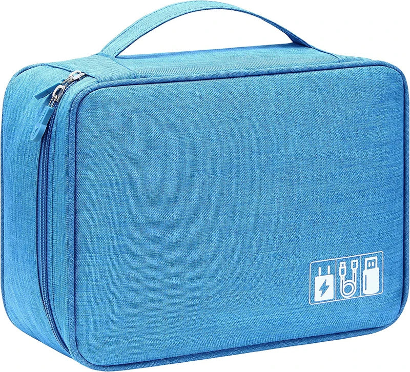 The Packt Wired inside carry-on — perfect fit in bag side pocket