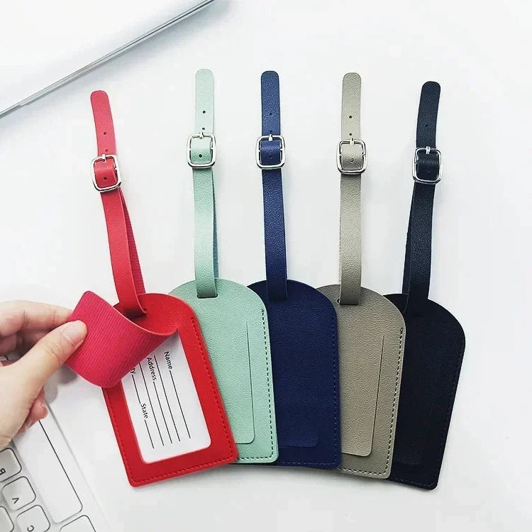 The Packt Tag in Navy — durable water-resistant PU leather bag tag for travel