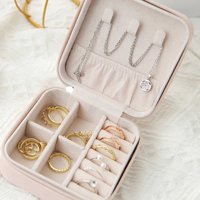 The Packt Jewels travel jewelry organizer — interior detail showing padded compartments and necklace hooks