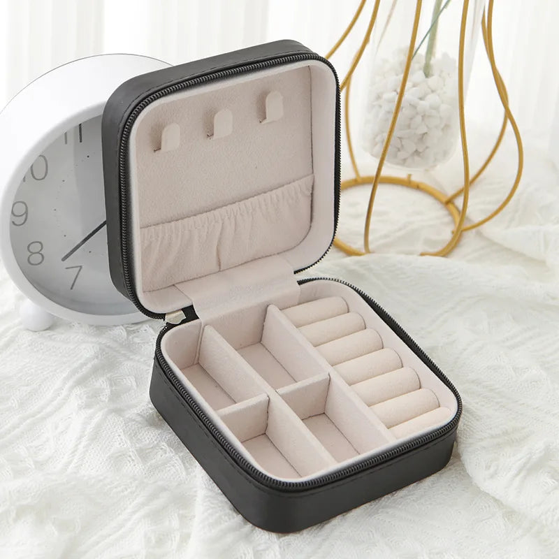 The Packt Jewels travel jewelry organizer — side profile showing slim hard-shell form factor