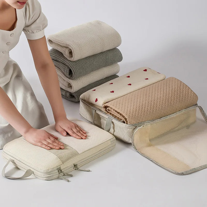 The Packt Cubes in Beige — 4 graduated compression cubes for a full week of travel