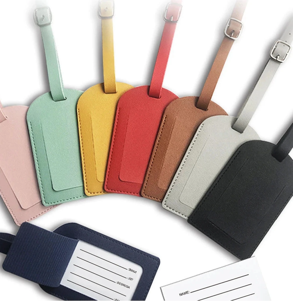 The Packt Tag PU leather luggage tag in Black — front view with clear ID window