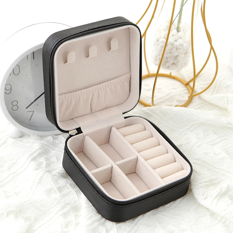 The Packt Jewels travel jewelry organizer in Pink — front view showing hard-shell clamshell design