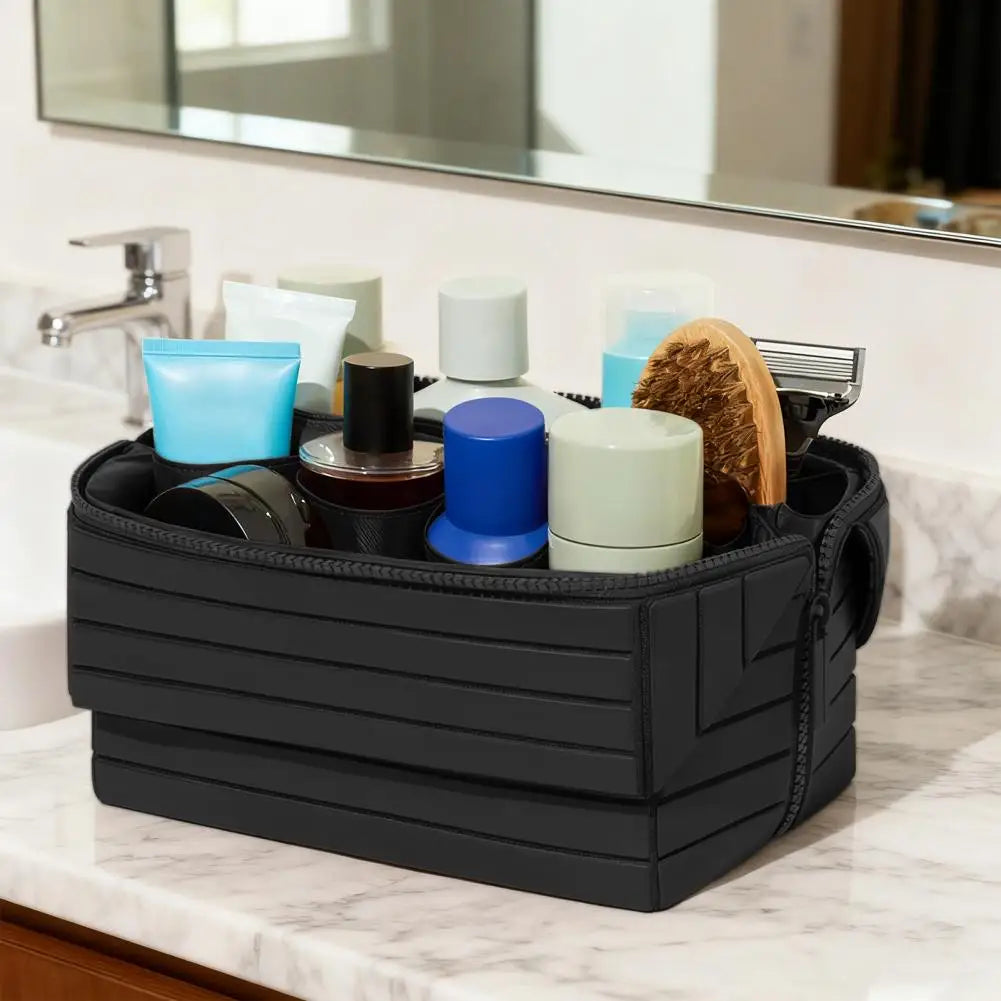 The Compackt Traveller fold-down travel bag — front view showing waterproof exterior and carry handle