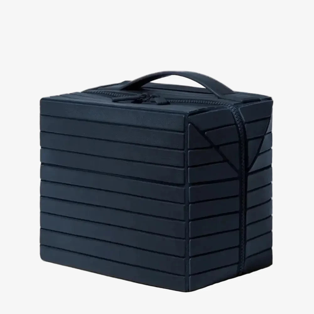 The Compackt Traveller — fold-back top fully open for complete visibility of all products at once