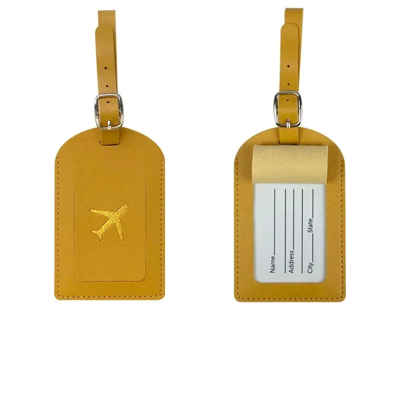 The Packt Tag flat lay — front and back view of PU leather luggage tag