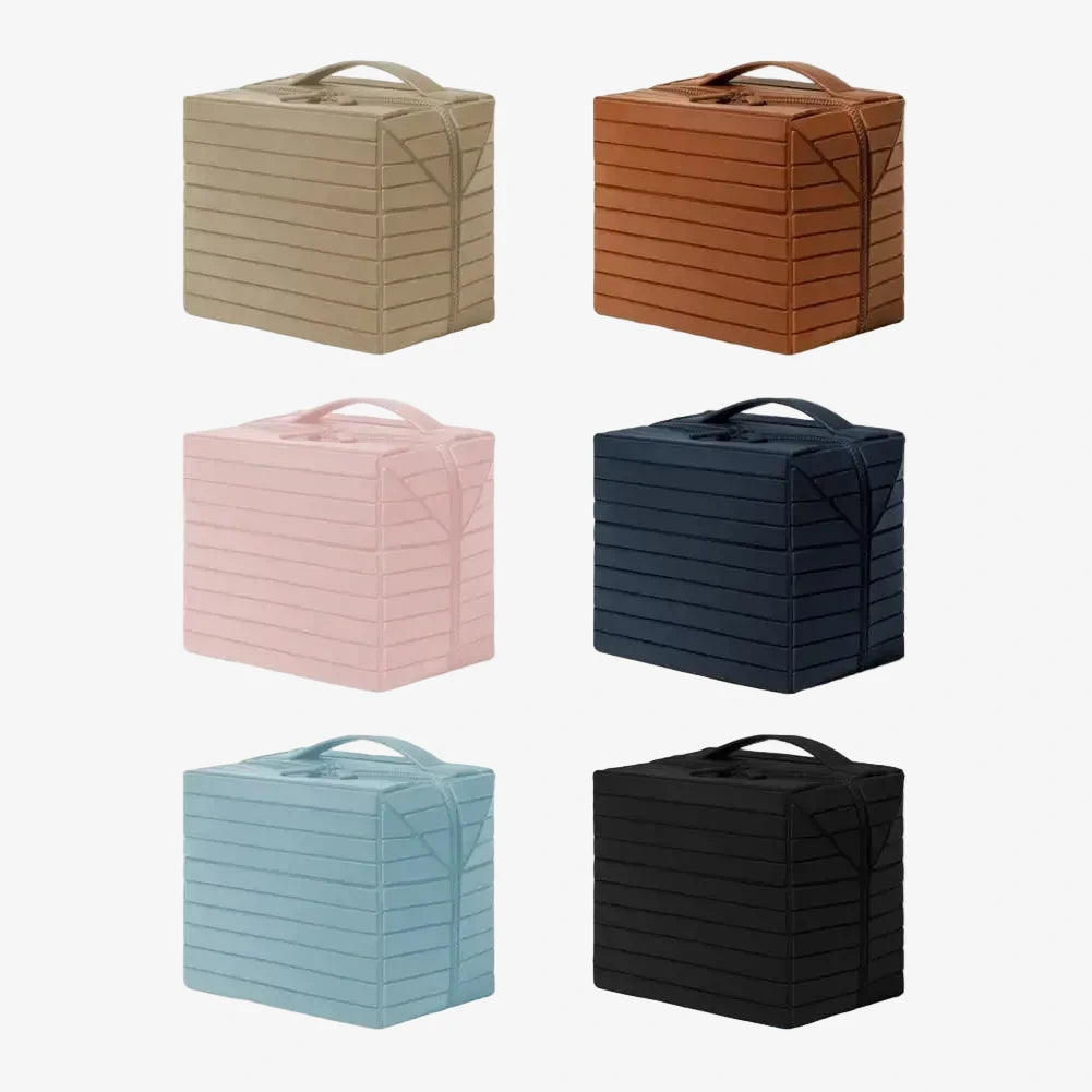 The Compackt Traveller — size comparison showing compact footprint when folded flat for packing