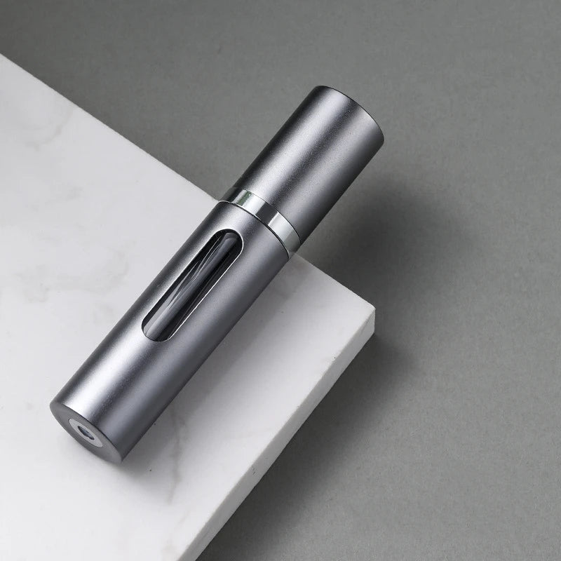 The Packt Atomizer — precision spray demonstration showing fine mist