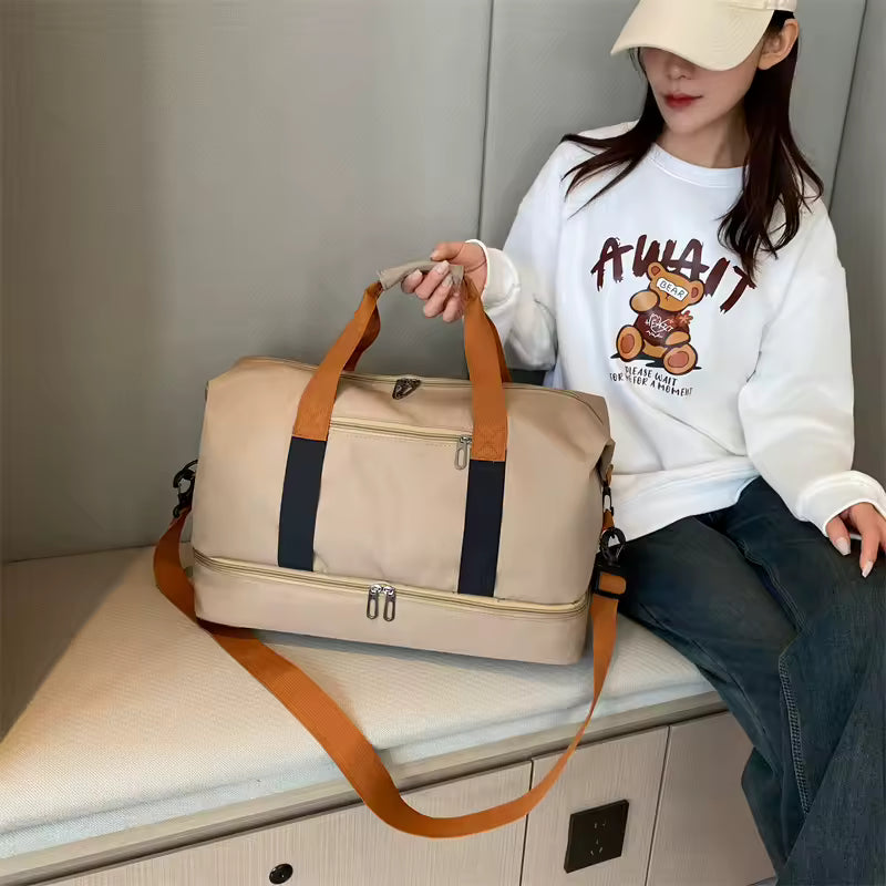 The Packt Weekender weekender bag carried by the adjustable shoulder strap