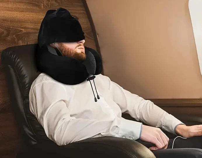 The Packt Pillow — side profile showing U-shaped memory foam neck support