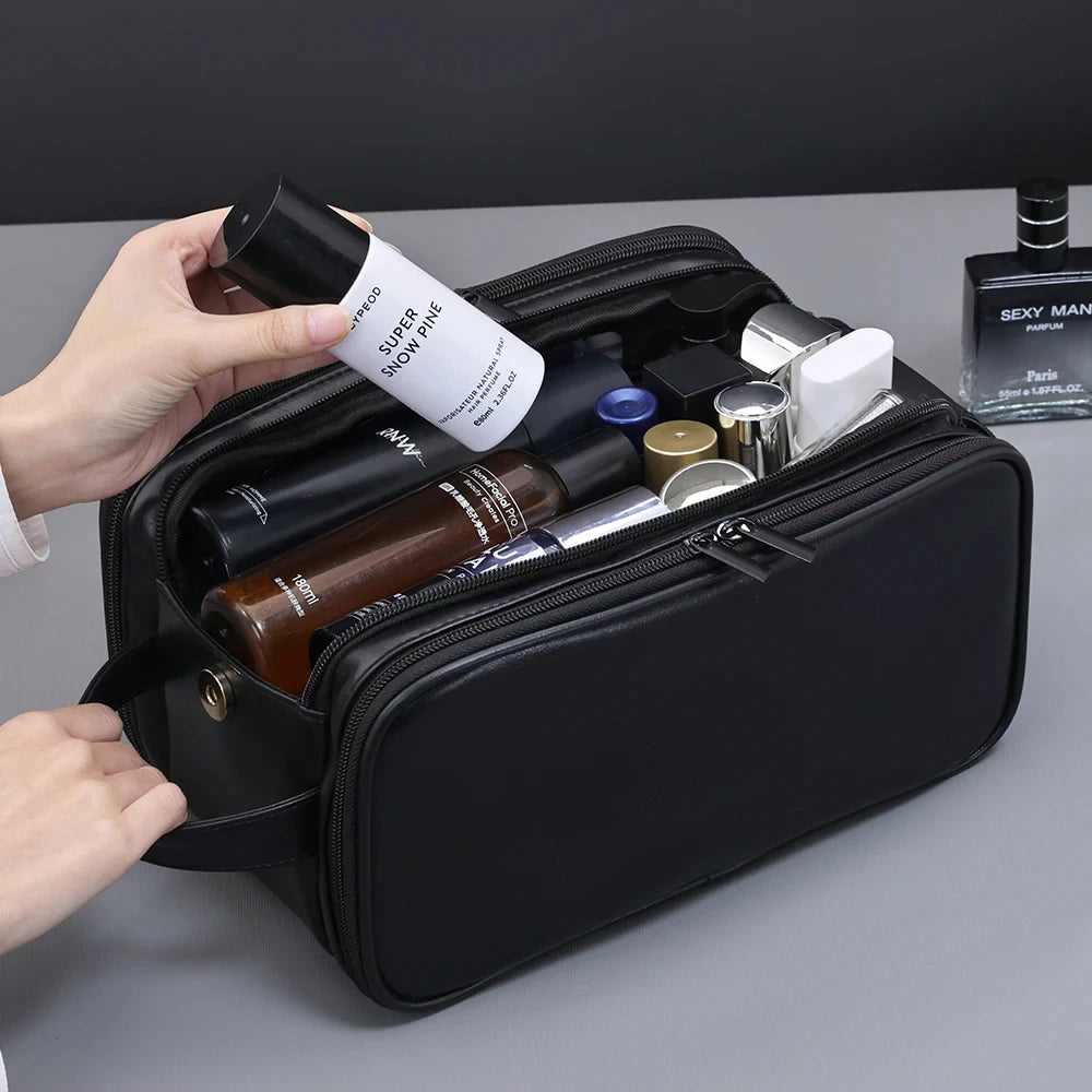 The Packt Kit fully opened — both side flaps folded out with elastic loops holding grooming items
