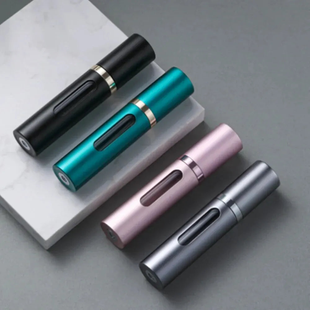 The Packt Atomizer in Gold — front view of 5ml glass travel perfume bottle