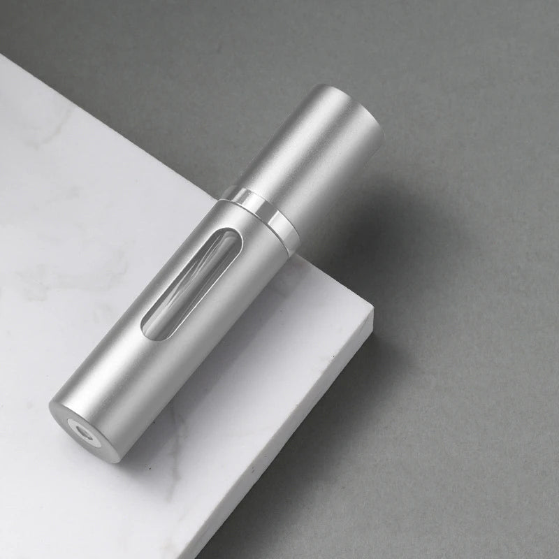 The Packt Atomizer — close-up of glass body and chrome pump top
