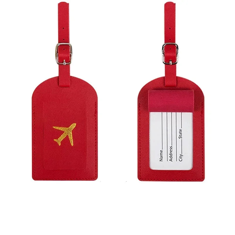 The Packt Tag in Grey — PU leather bag tag with clear ID window