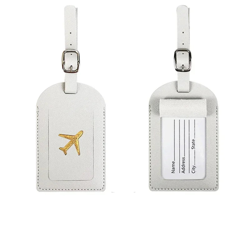 The Packt Tag in Red — water-resistant PU leather bag tag with loop closure