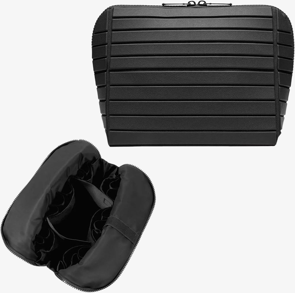 The Packt Traveller toiletry bag in Black — open view showing 27 pockets and adjustable dividers