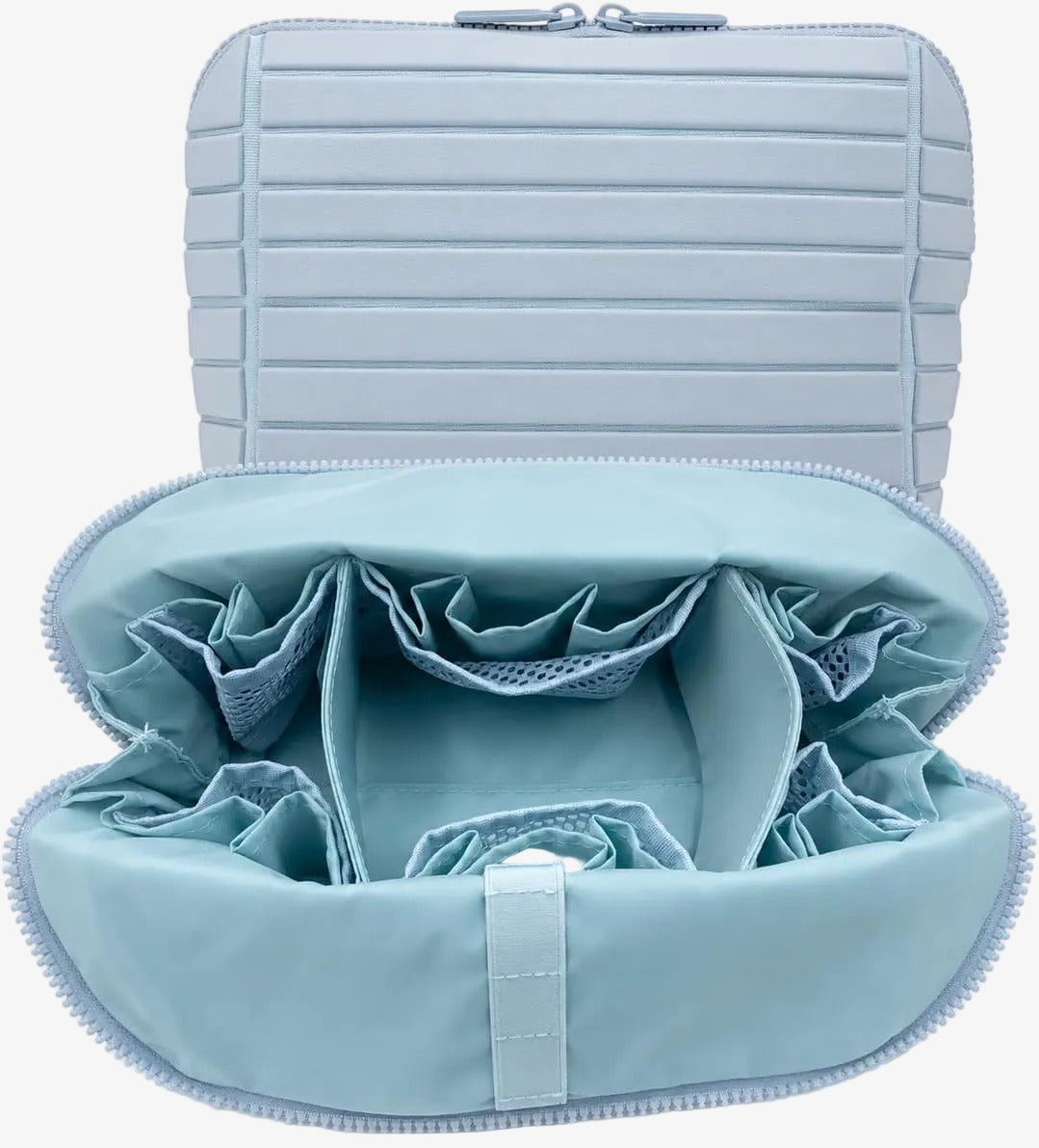 The Packt Traveller toiletry bag in Blue — open view showing 27 pockets and adjustable dividers