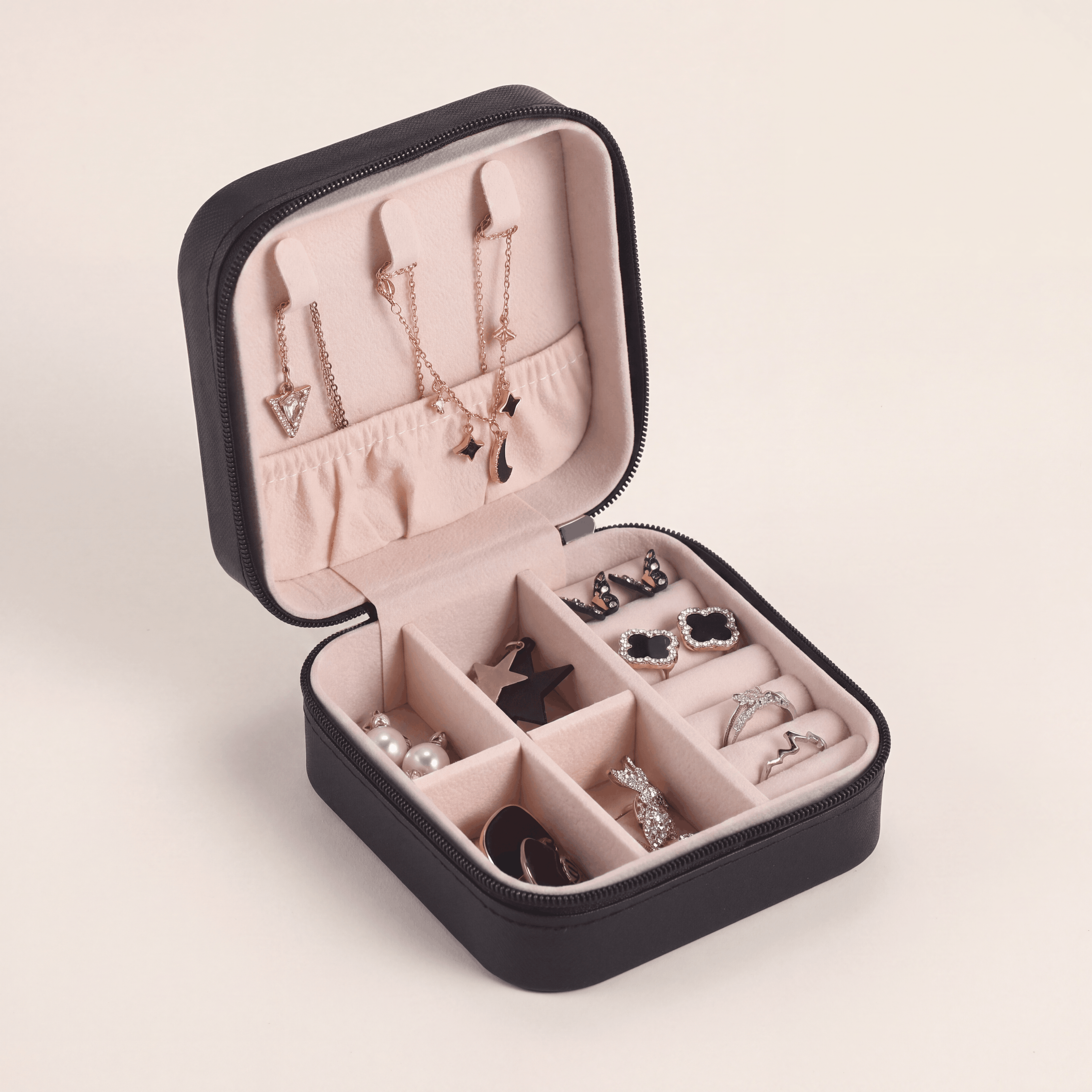 The Packt Jewels — compact hard-shell travel jewelry case for rings, earrings, and pendants