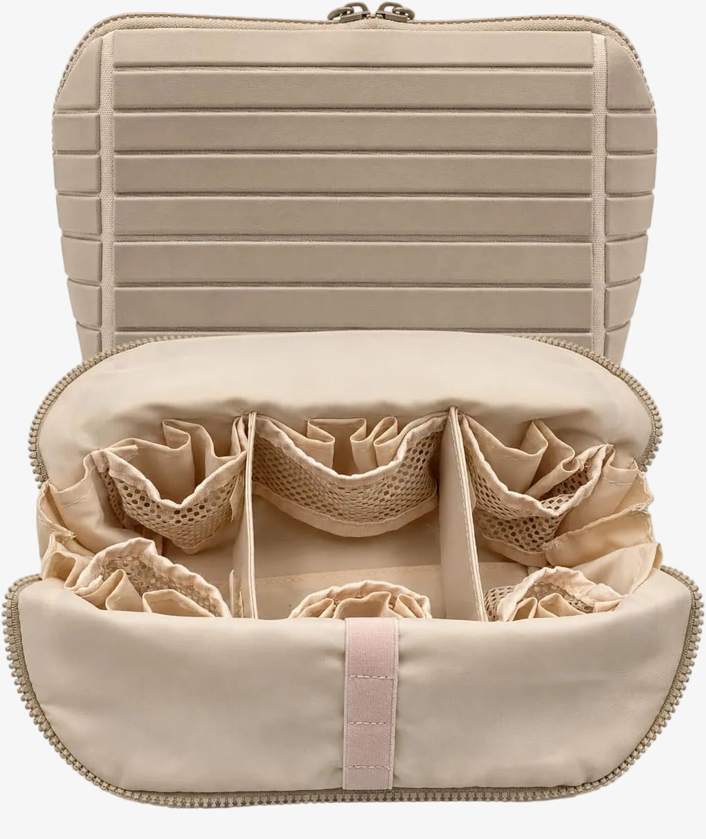The Packt Traveller toiletry bag in Khaki — open view showing 27 pockets and adjustable dividers