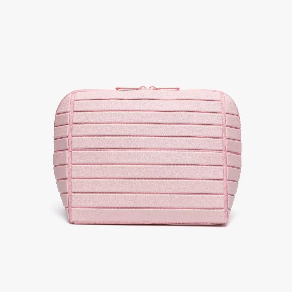 The Packt Traveller toiletry bag in Pink — front view with ribbed panels